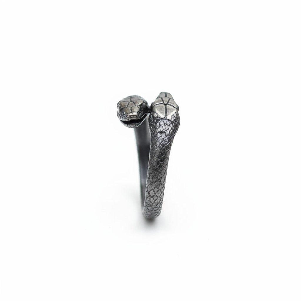 Maniac double snake ring in stainless steel, gothic reptile jewelry with intricate scale detail.