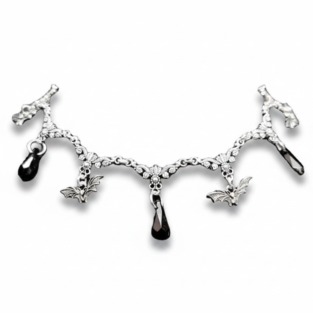 Maniac gothic bat necklace made of stainless steel with black teardrop charms and intricate detailing.