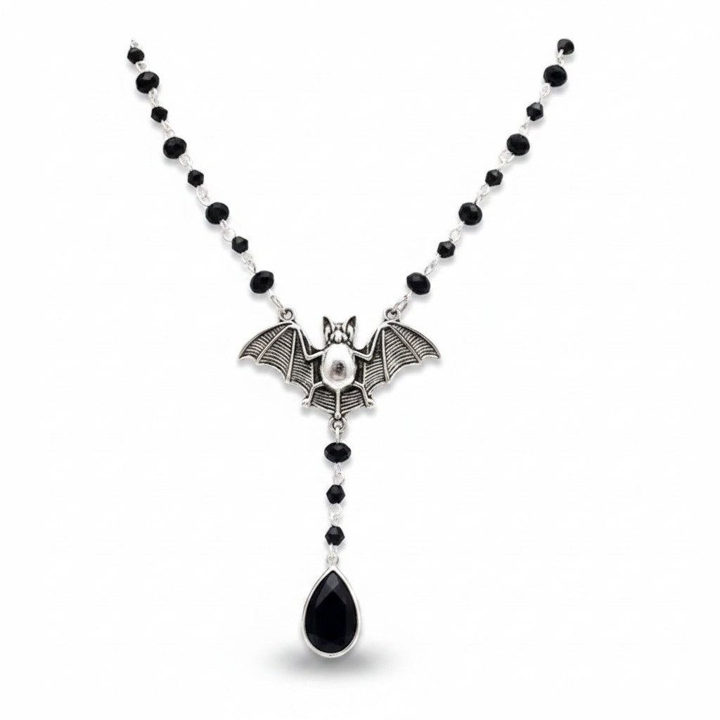 Maniac gothic bat necklace with black beads and a teardrop pendant. Stainless steel.