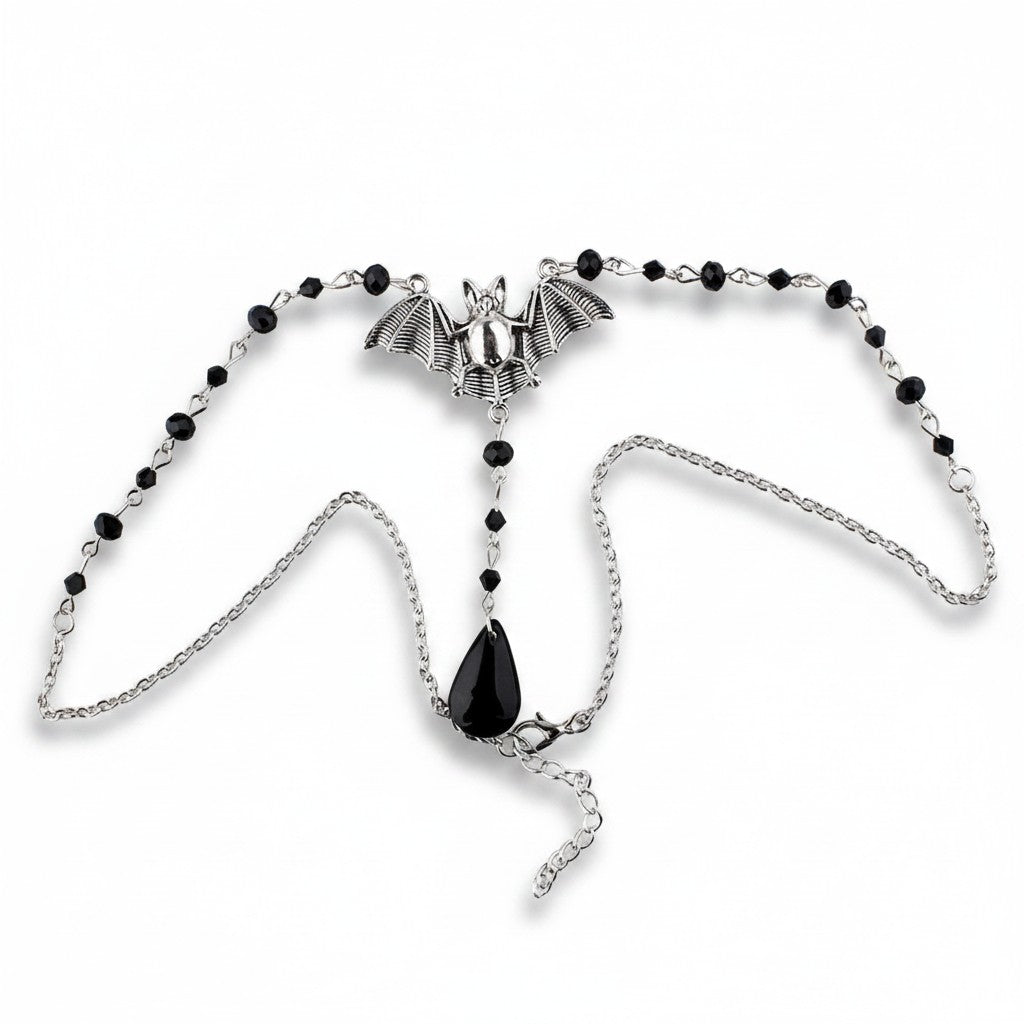 Maniac gothic bat necklace with black beads and a teardrop charm, made of stainless steel.