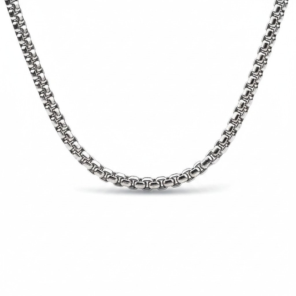 Maniac silver stainless steel gothic cross amulet pendant necklace with ornate detailing.