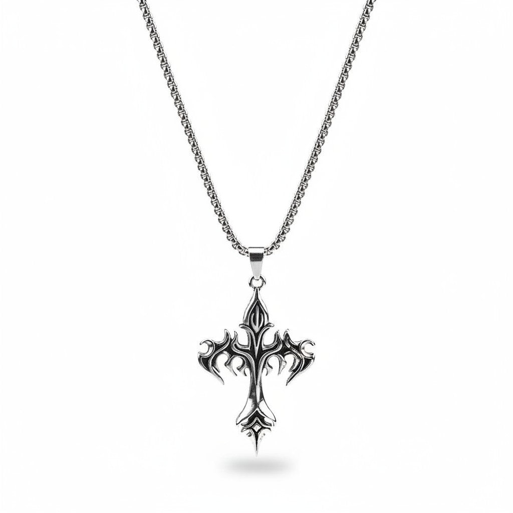 Maniac silver stainless steel gothic cross amulet pendant necklace with ornate detailing.