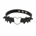 Maniac black faux leather choker with silver heart and bat wings, gothic punk style.