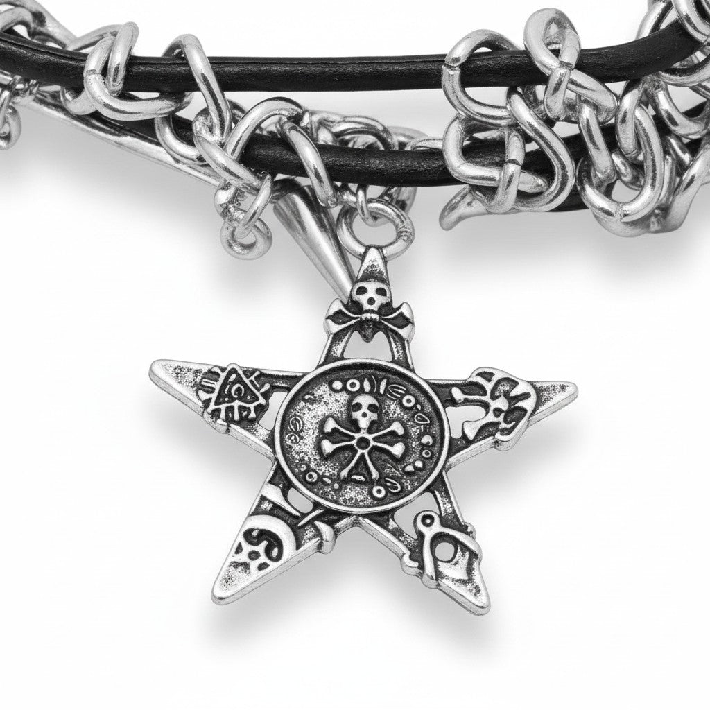 Maniac black leather choker necklace with silver star pendant, spikes, and chain details. Gothic punk jewelry.