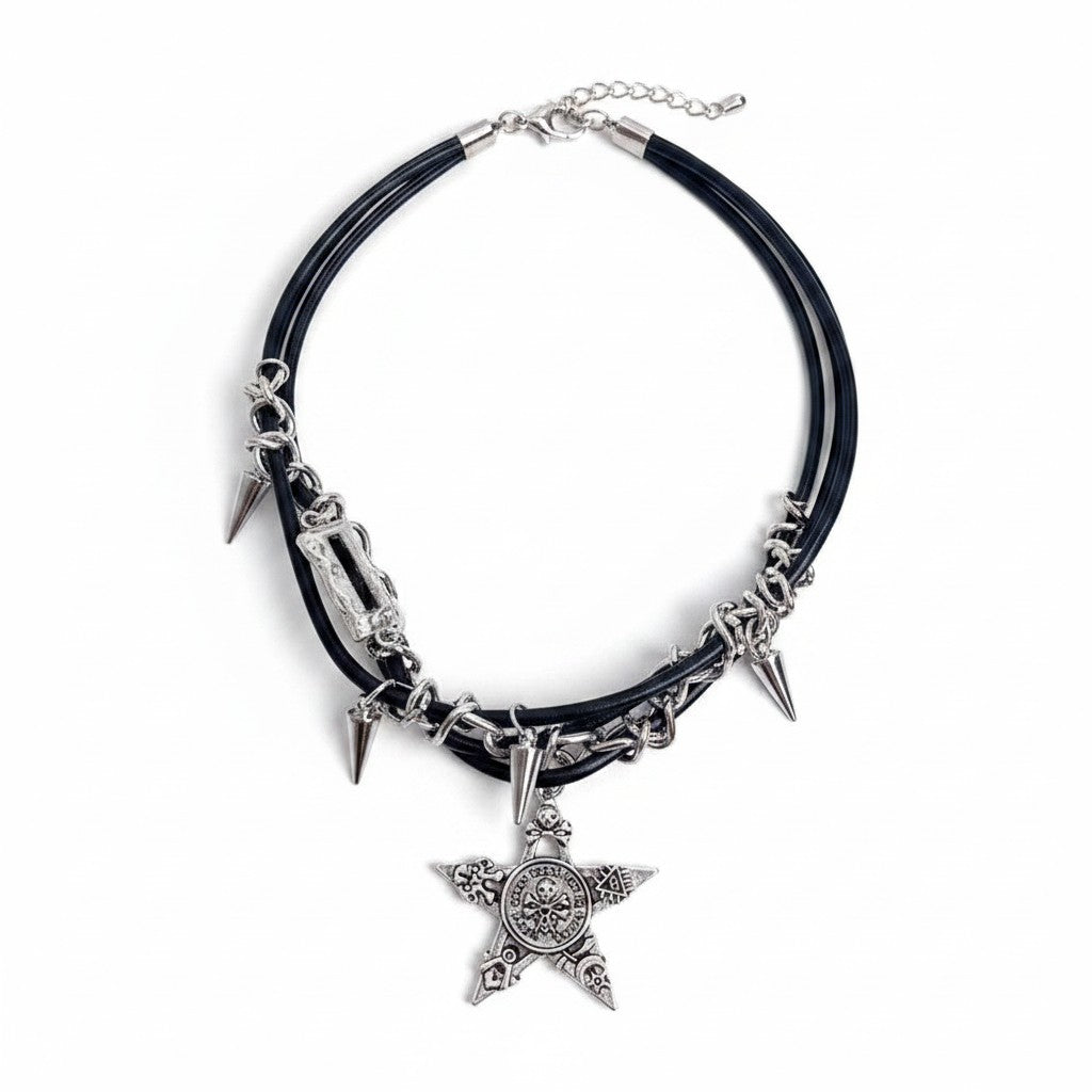 Maniac gothic punk necklace with black leather cords, silver chains, spikes, and a star pendant featuring skulls and rivets.