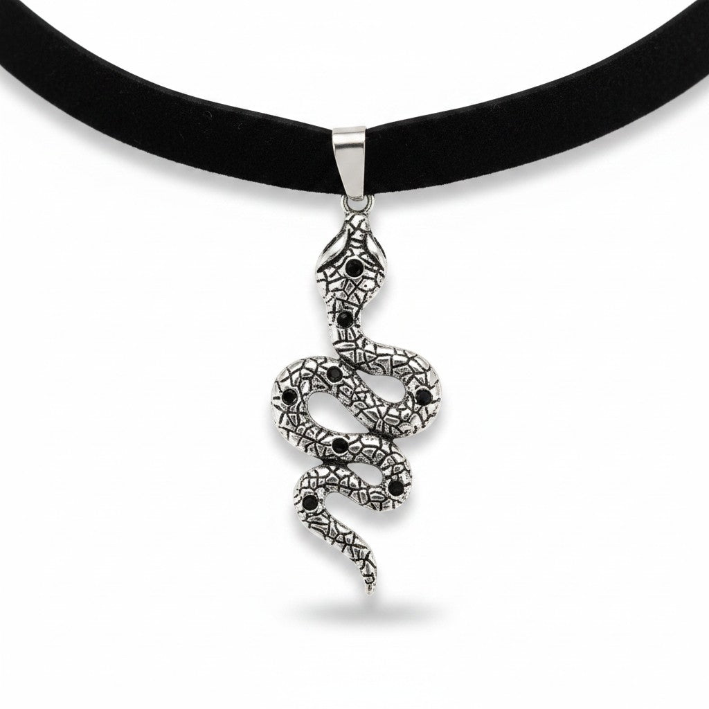 Maniac black velvet choker necklace with a silver snake pendant adorned with black stones.