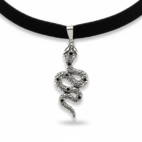Maniac black velvet choker necklace with a silver snake pendant adorned with black stones.