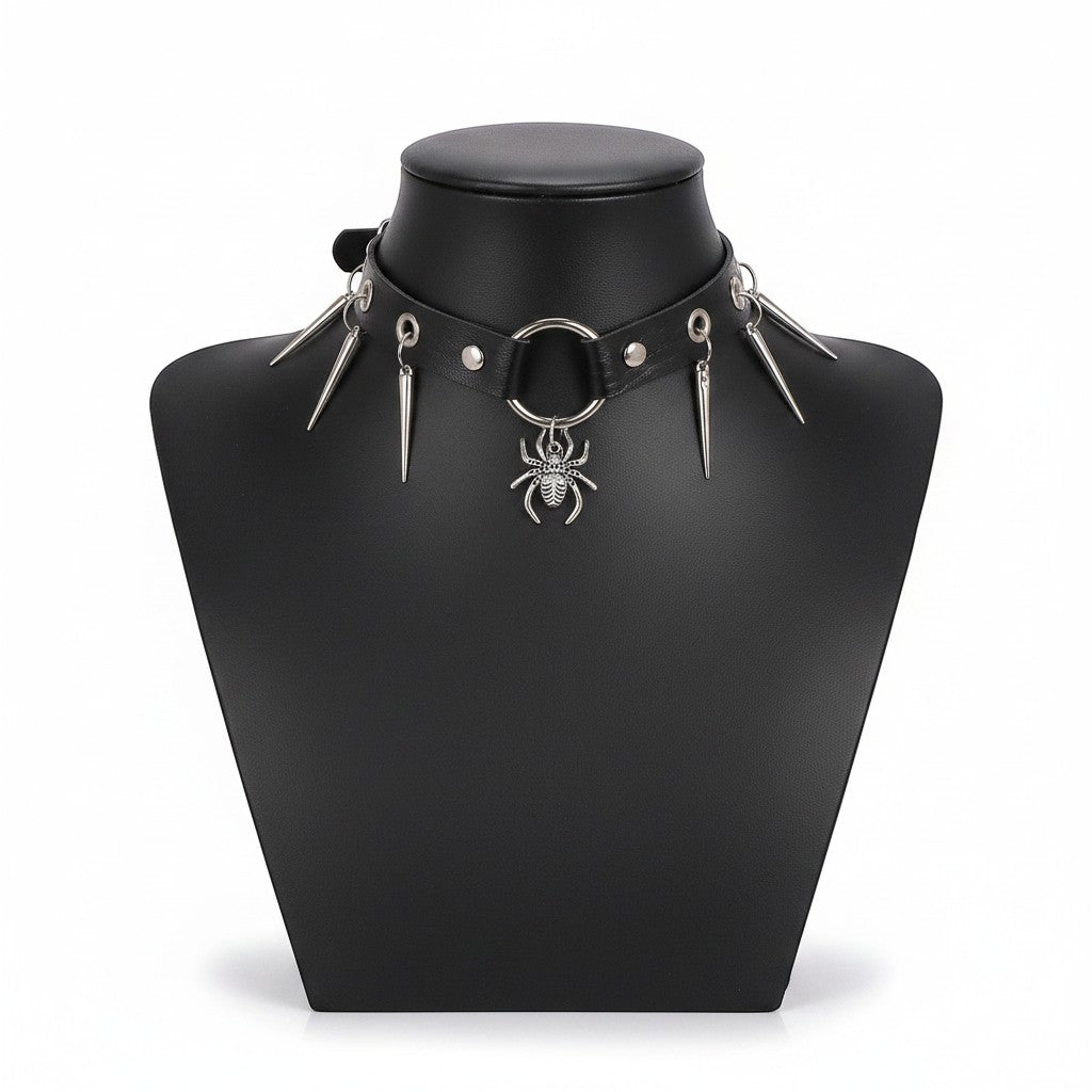 Maniac black leather punk choker necklace with silver spider and spike charms. Stainless steel.