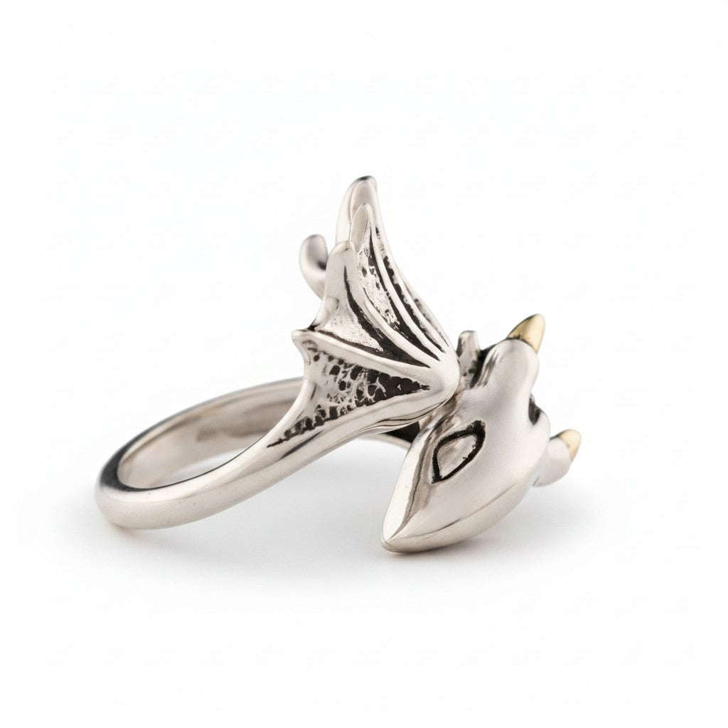 Maniac retro small flying dragon ring in silver stainless steel with gold accents on horns.