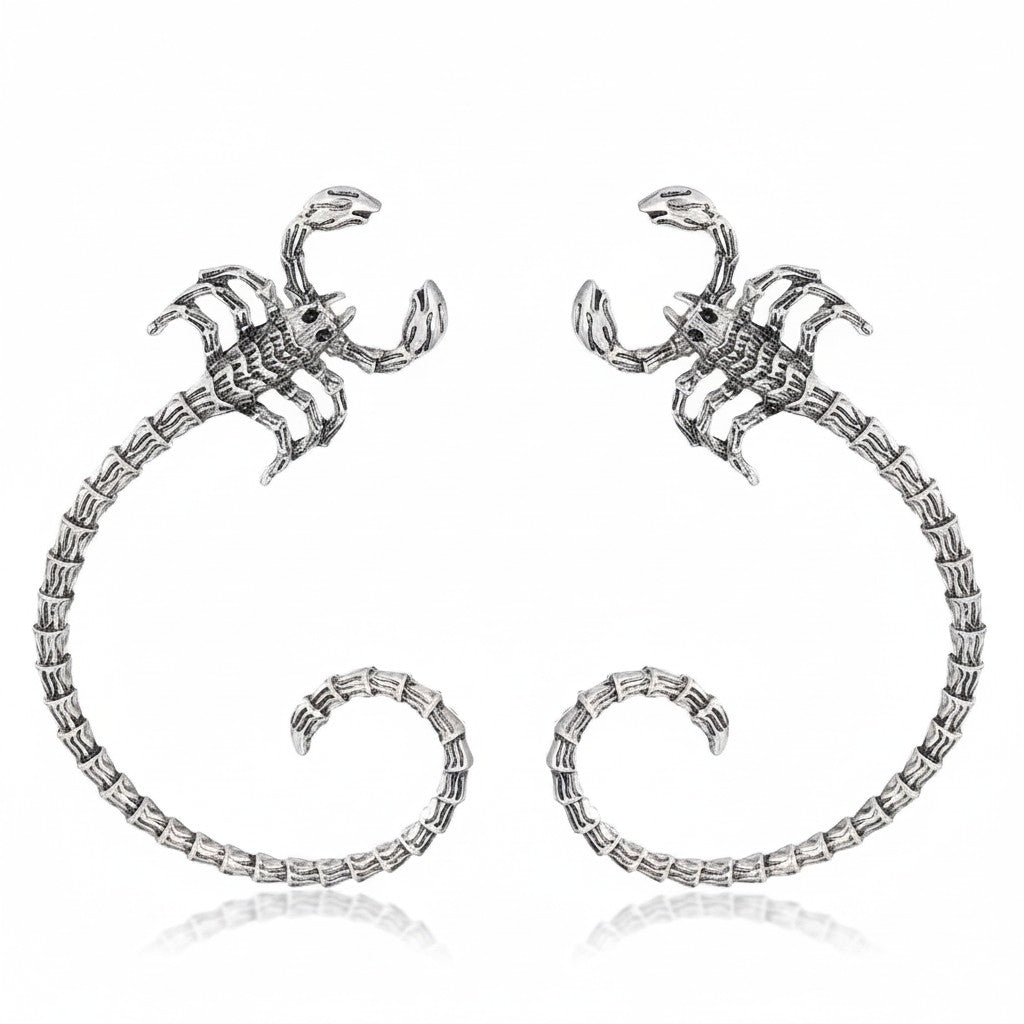 Maniac silver-tone stainless steel scorpion ear cuffs with intricate segmented tails and claw details. Gothic, hip-hop style.