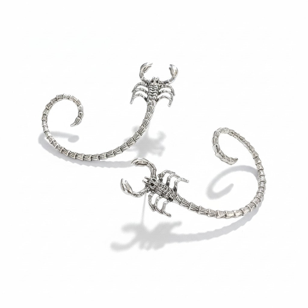 Maniac silver-tone stainless steel scorpion ear cuff and ear hook earrings with intricate detailing.