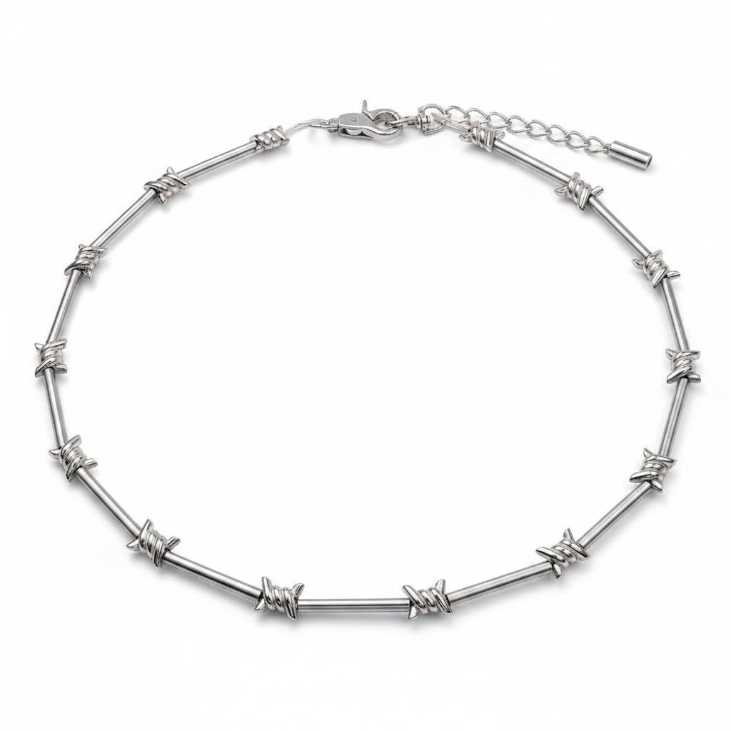Maniac silver stainless steel barbed wire choker necklace with lobster clasp.