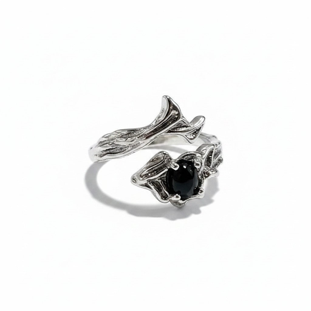 Maniac silver stainless steel ring with black rose design and thorn details. Adjustable, unisex.