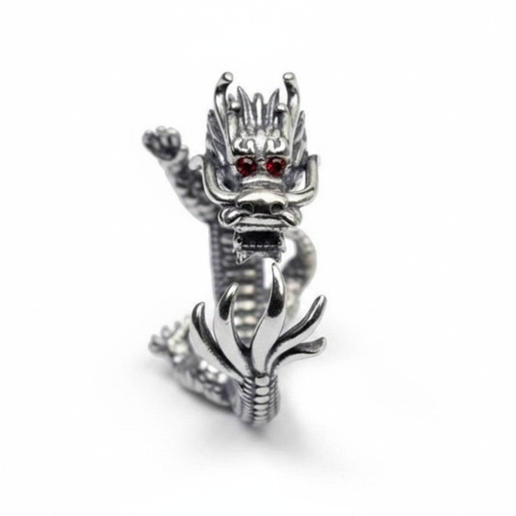 Maniac silver stainless steel dragon ring with red gem eyes, detailed scales and claws.