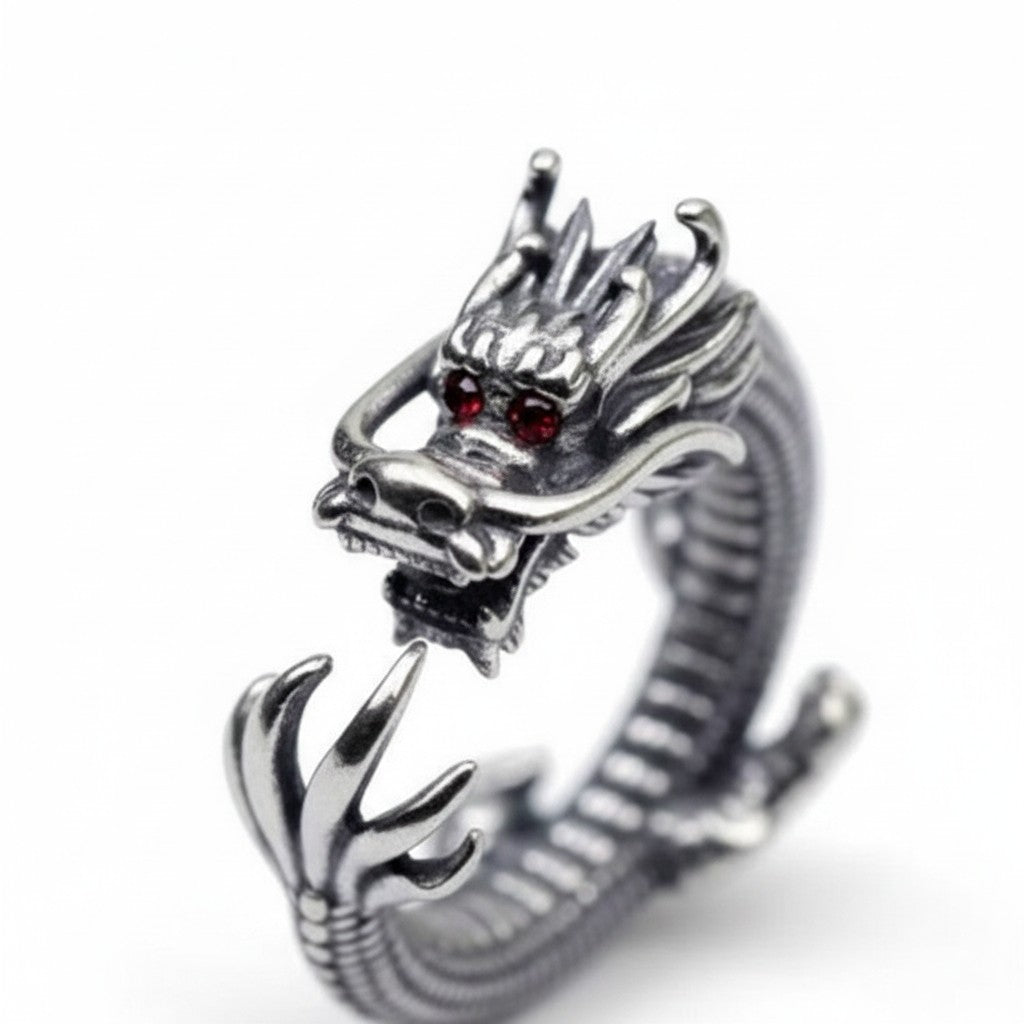 Maniac silver stainless steel dragon ring with red gem eyes, featuring intricate scales and claws. Retro style.
