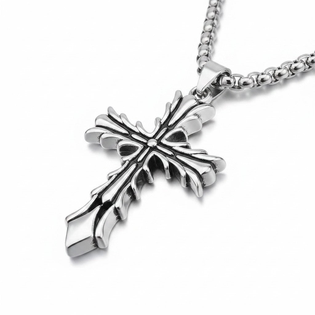 Maniac silver stainless steel gothic cross pendant necklace with ornate detailing, suitable for men and women.