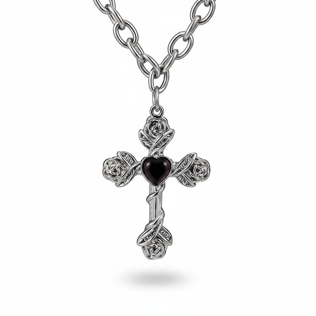 Maniac silver stainless steel cross necklace with rose details and black heart pendant.