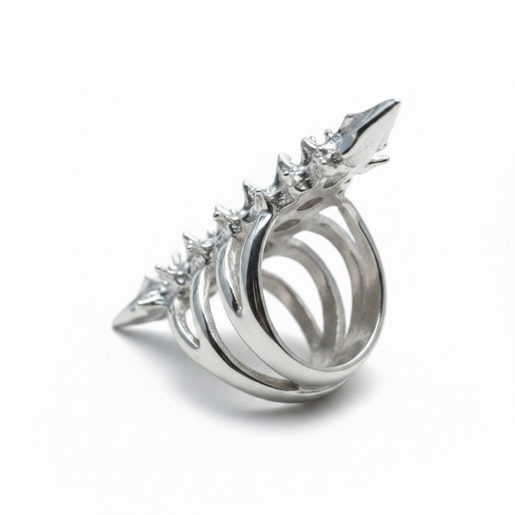 Maniac silver stainless steel skeleton ring with gothic spike details.