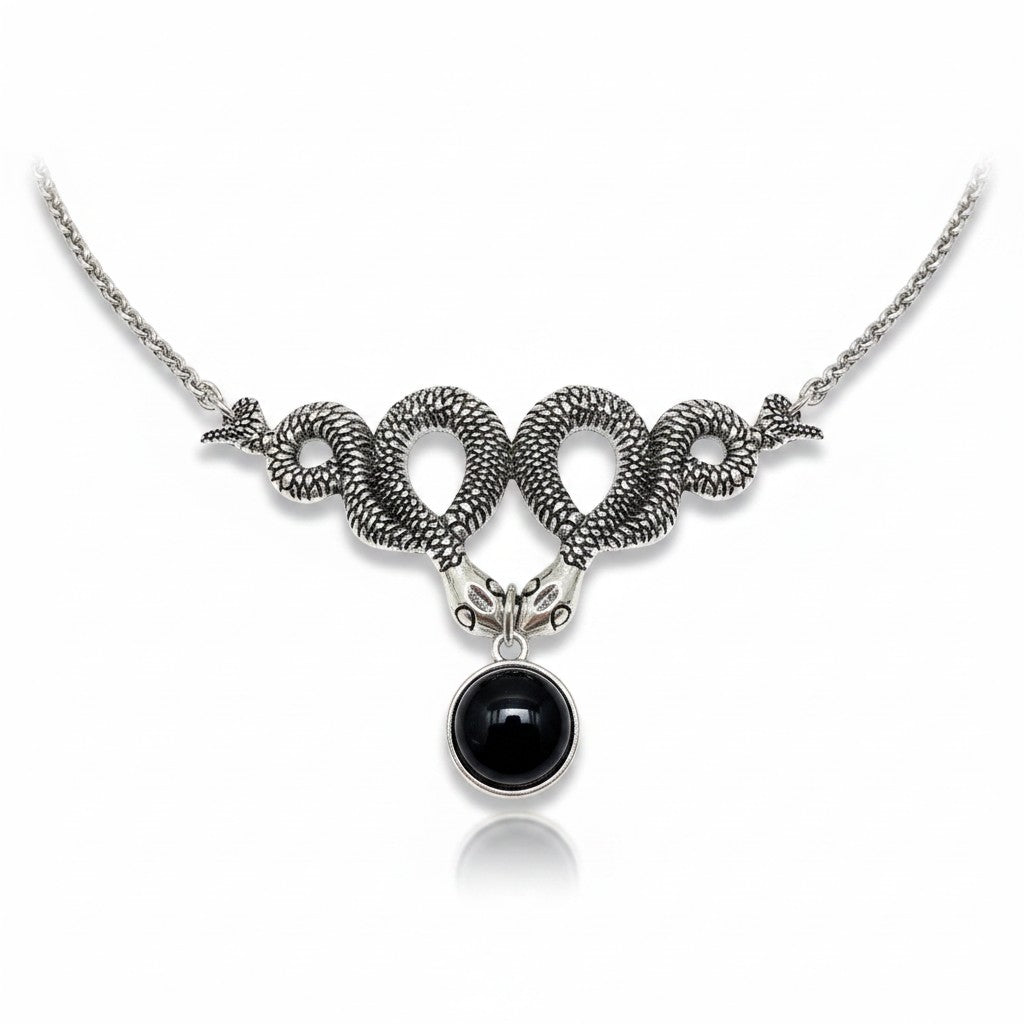 Maniac silver snake necklace with black labradorite pendant, gothic jewelry style.