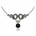 Maniac silver snake necklace with black labradorite pendant, gothic jewelry style.