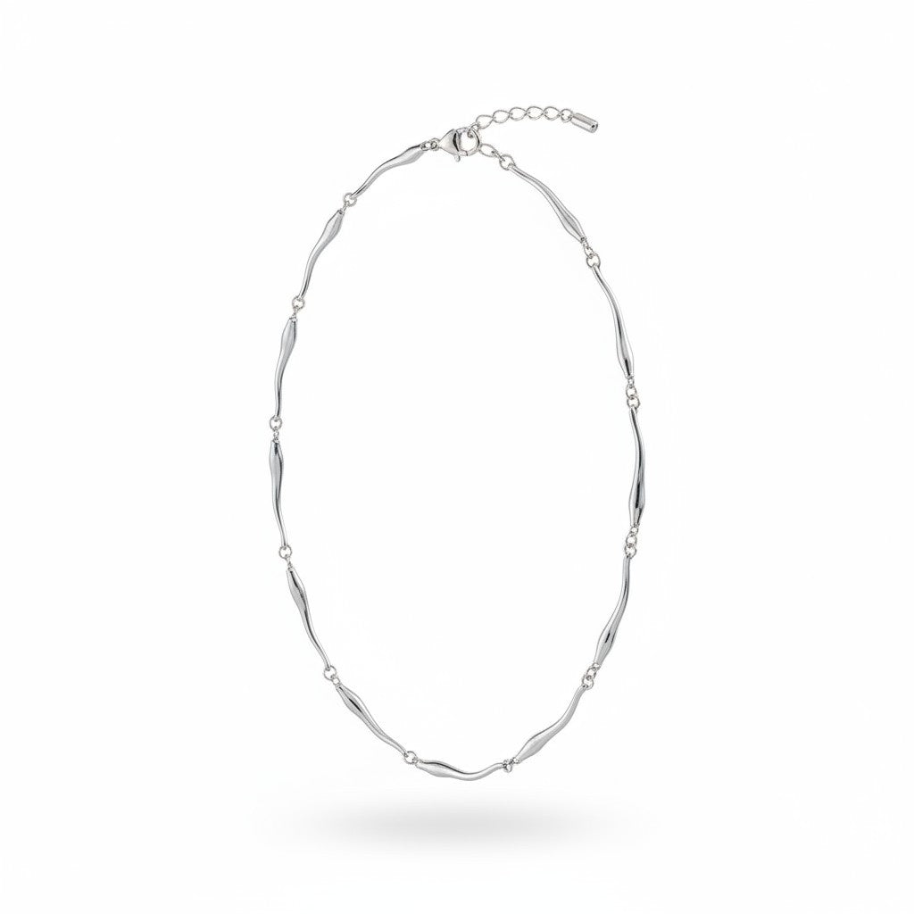 Maniac silver stainless steel necklace with irregular wavy links and adjustable clasp. Trendy unisex design.
