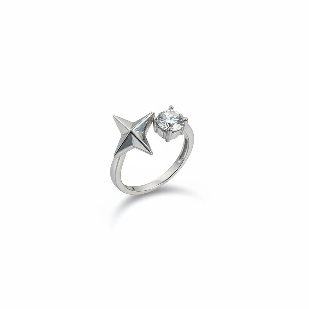 Maniac silver stainless steel ring with a sparkling diamond and a star design.