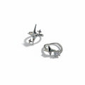 Maniac silver stainless steel ring with a sparkling diamond and star design. Adjustable opening.
