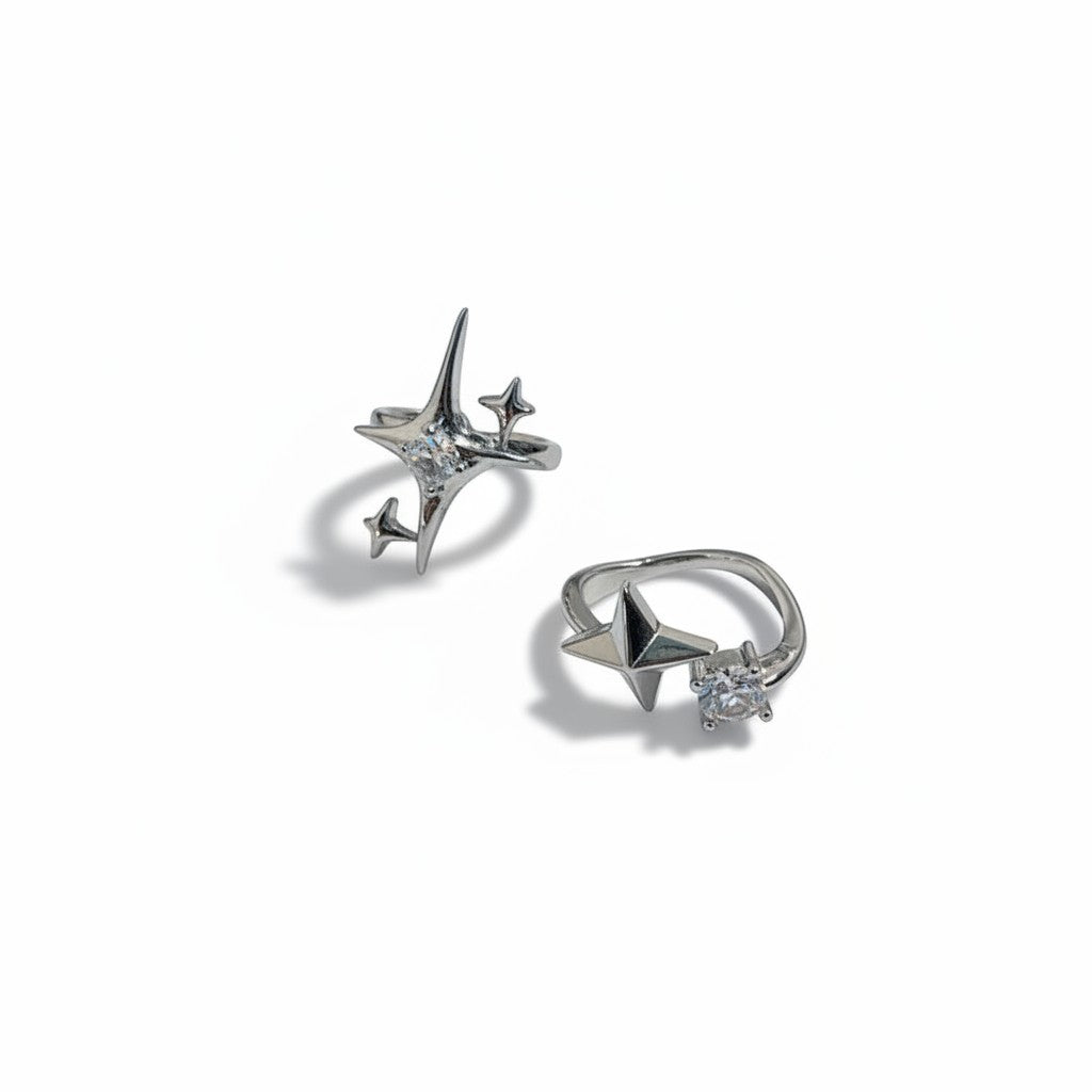 Maniac silver stainless steel ring with a sparkling diamond and star design. Adjustable opening.