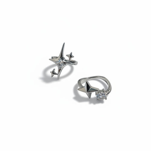 Maniac silver stainless steel ring with a sparkling diamond and star design. Adjustable opening.