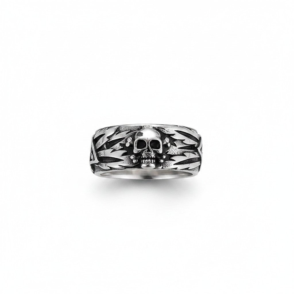 Maniac silver stainless steel ring with skull and wing design, vintage style.