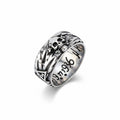 Maniac vintage stainless steel ring with skull and wing design, featuring engraved text.