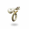 Maniac silver and gold stainless steel adjustable snake ring with red gem eyes. Gothic punk style jewelry.