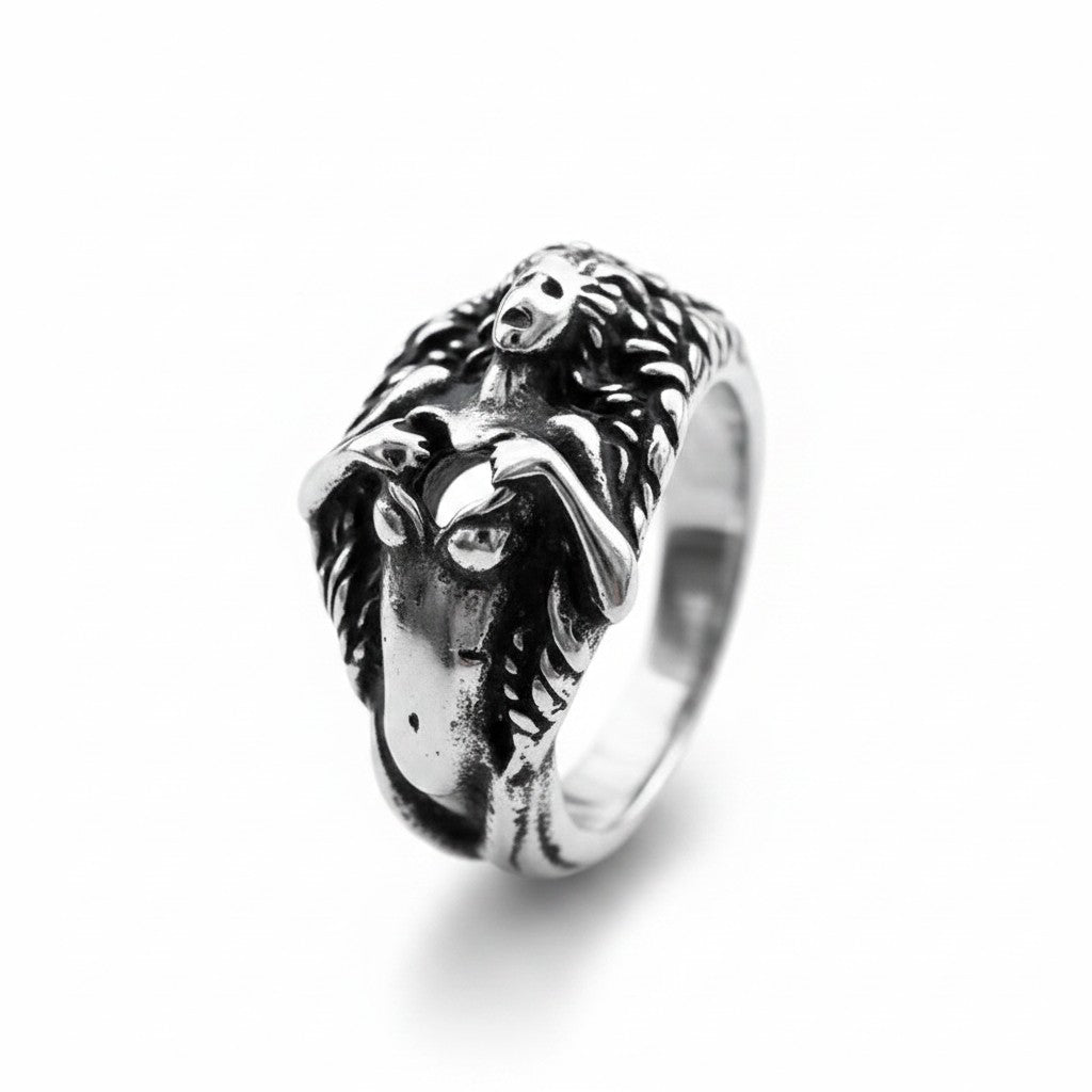 Maniac stainless steel men's ring with a detailed skull and flowing hair design.