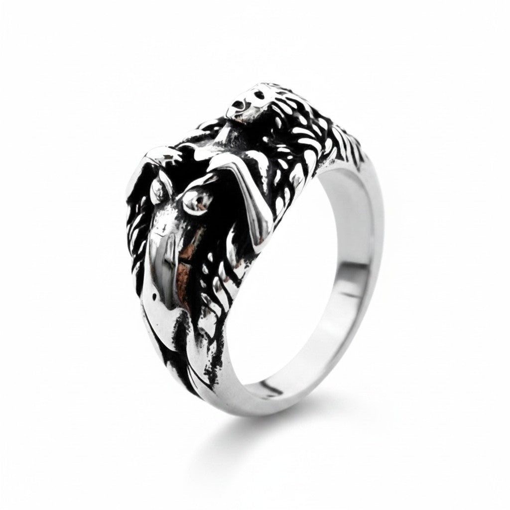 Maniac stainless steel men's ring with a detailed skull and skeletal figure design.