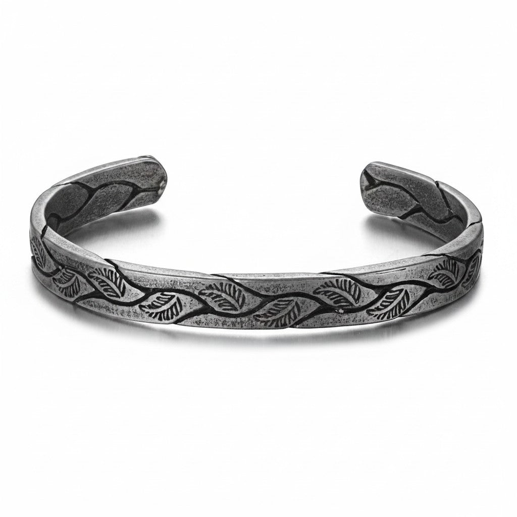 Maniac vintage Viking cuff bracelet in silver titanium steel with engraved leaf pattern.